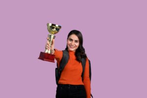 a person holding a trophy